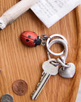 Porte cles en bois coccinelle